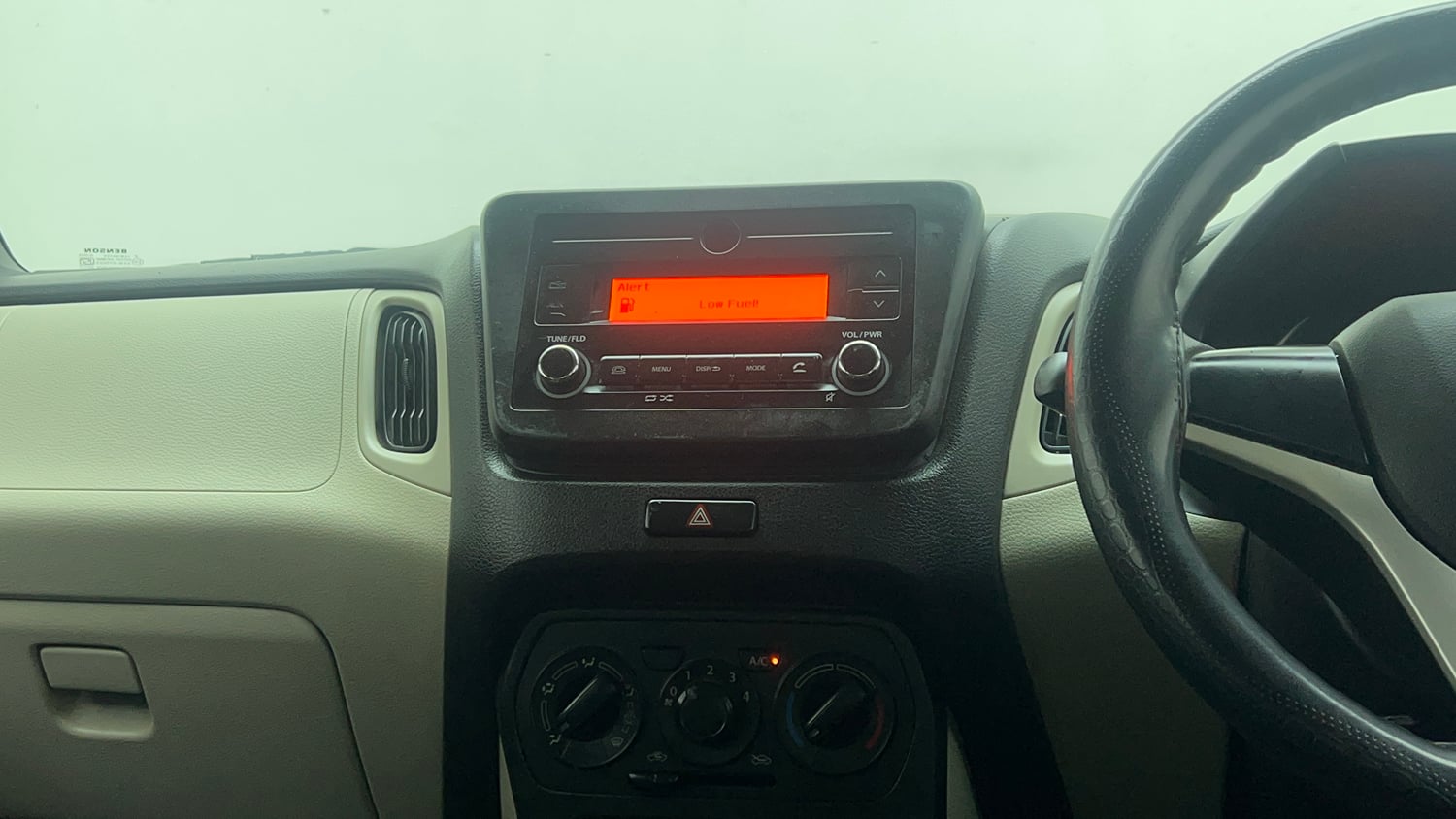 Used 2021 Maruti Suzuki Wagon R 1.0 VXi 1.0 Petrol Manual top_features Integrated (in-dash) music system
