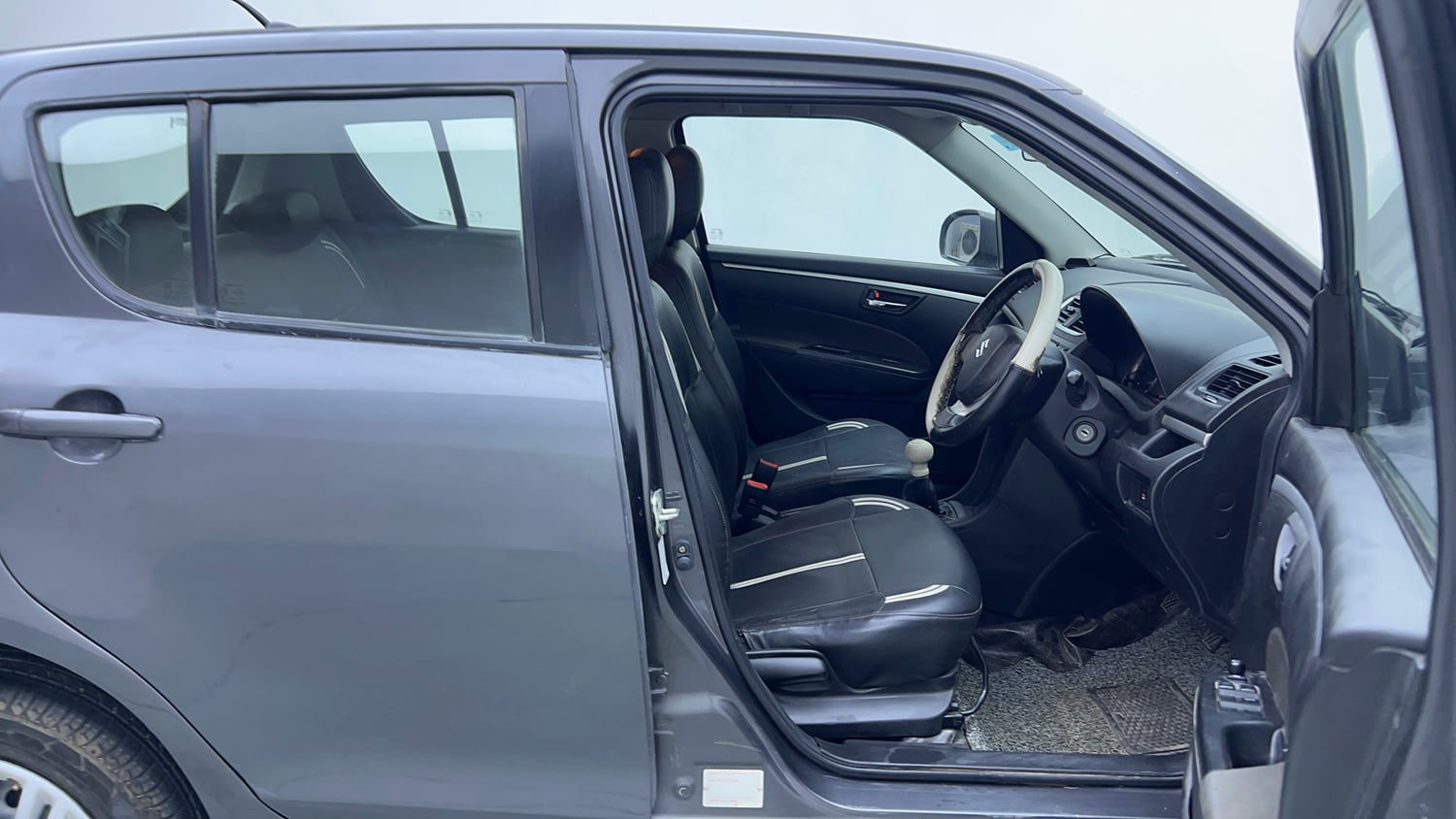 Used 2015 Maruti Suzuki Swift VXi Petrol Manual interior RIGHT SIDE FRONT DOOR CABIN VIEW