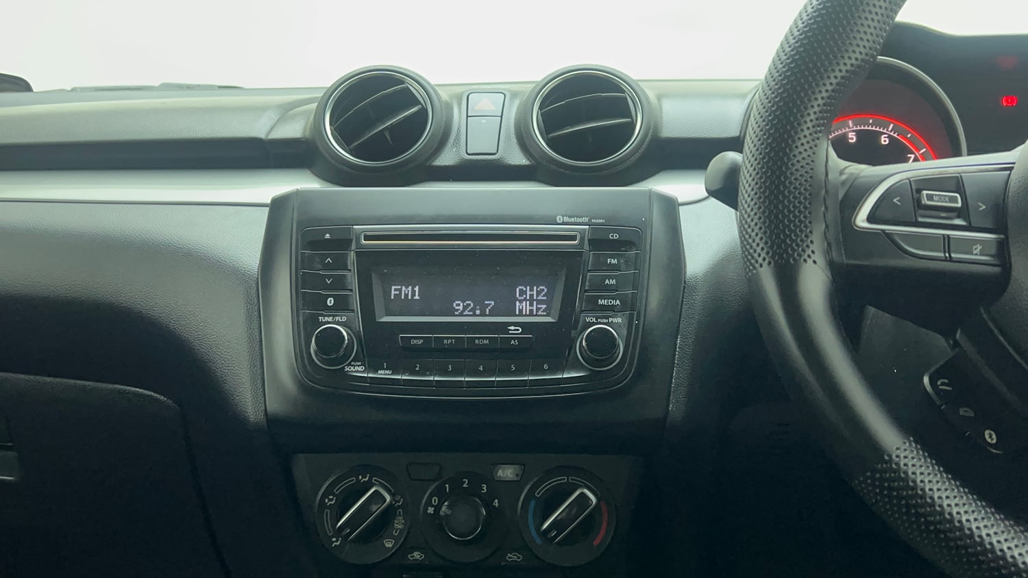 Used 2018 Maruti Suzuki Swift VXi Petrol Manual top_features Integrated (in-dash) music system