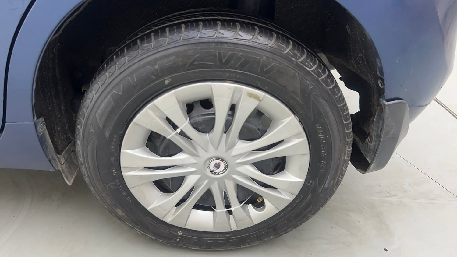 Used 2017 Maruti Suzuki Baleno Delta 1.2 Petrol Manual tyres LEFT REAR TYRE RIM VIEW