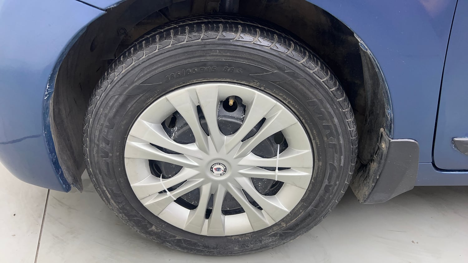 Used 2017 Maruti Suzuki Baleno Delta 1.2 Petrol Manual tyres LEFT FRONT TYRE RIM VIEW
