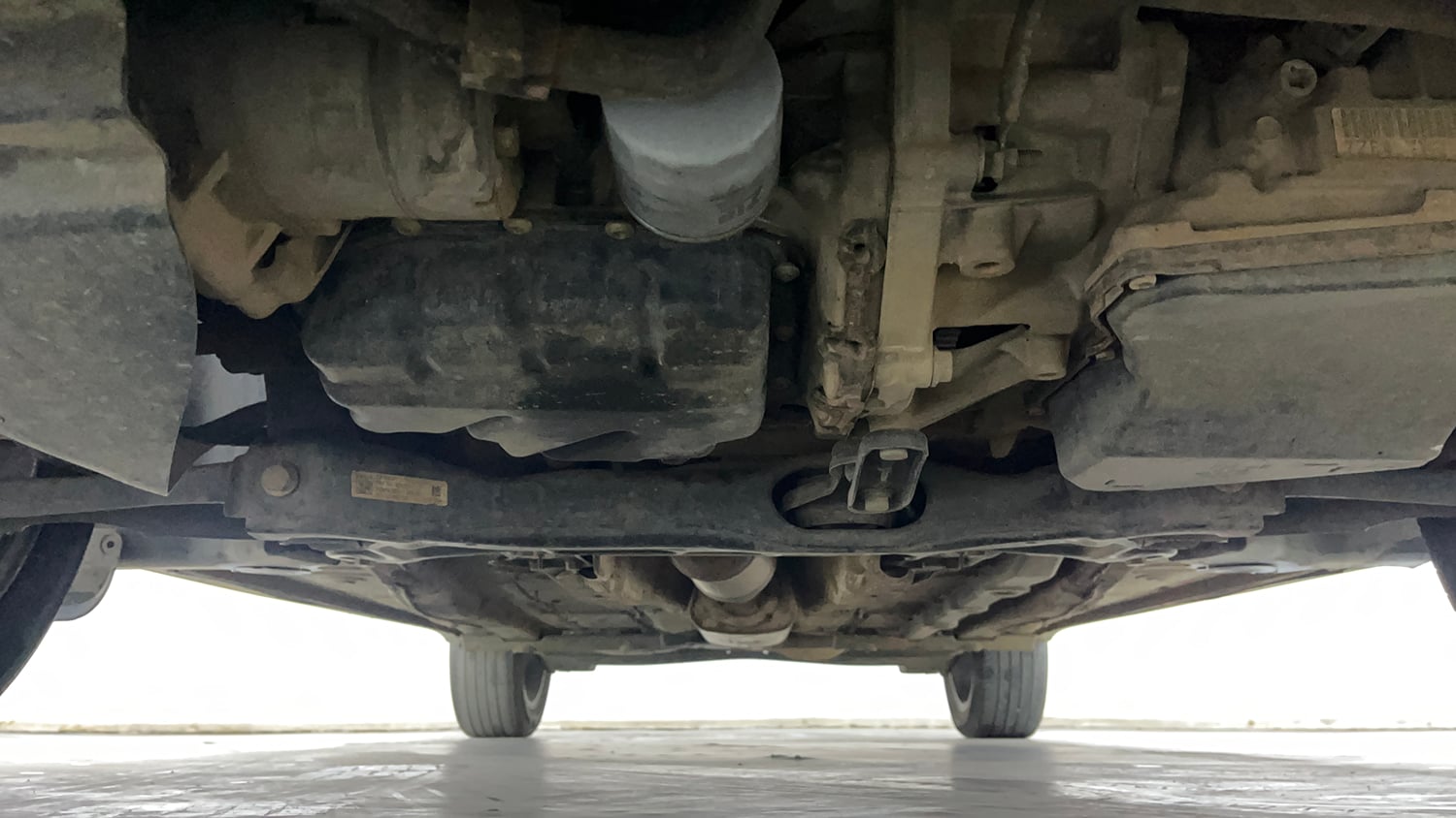 Used 2023 Volkswagen Taigun Topline 1.0 TSI AT Petrol Automatic extra FRONT LEFT UNDERBODY VIEW