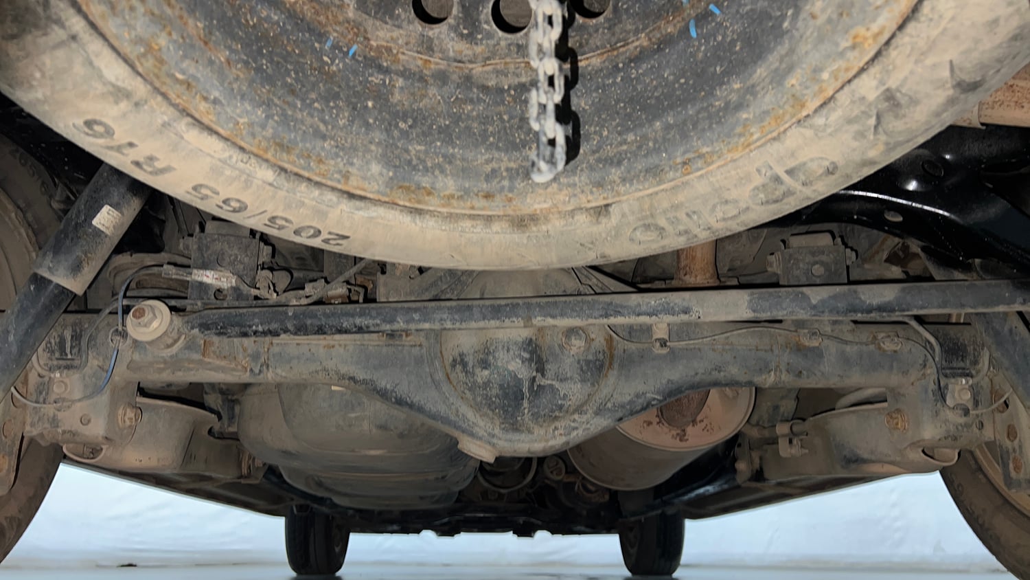 Used 2022 Toyota Innova Crysta VX 2.7 7 STR Petrol Manual extra REAR UNDERBODY VIEW (TAKEN FROM REAR)