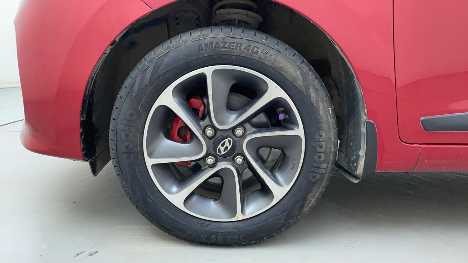 Used 2019 Hyundai Grand i10 Sportz 1.2 Kappa VTVT Petrol Manual tyres LEFT FRONT TYRE RIM VIEW