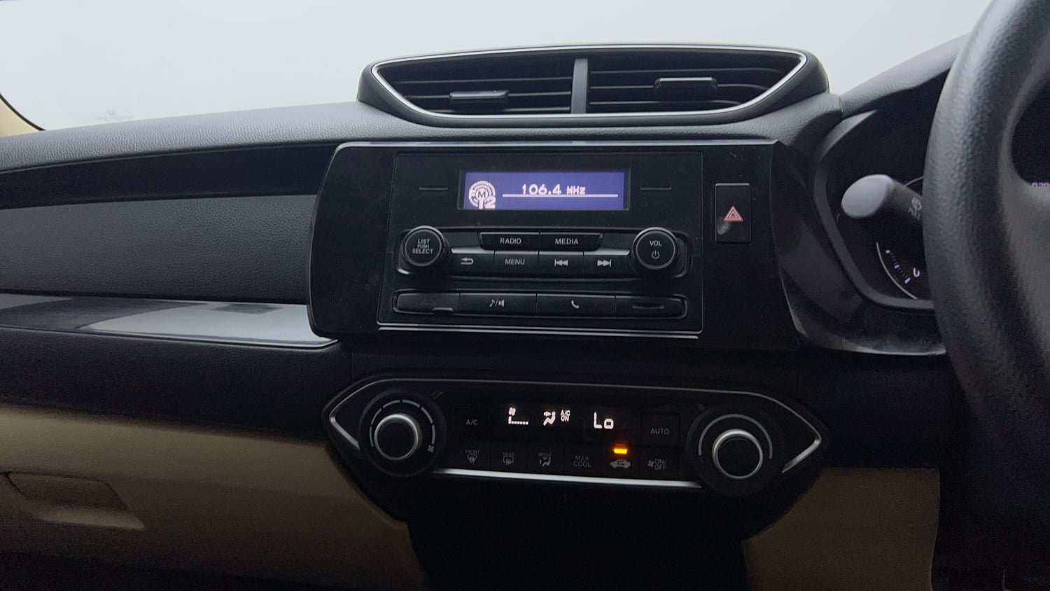Used 2018 Honda Amaze 1.2 V MT Petrol Petrol Manual top_features Integrated (in-dash) music system