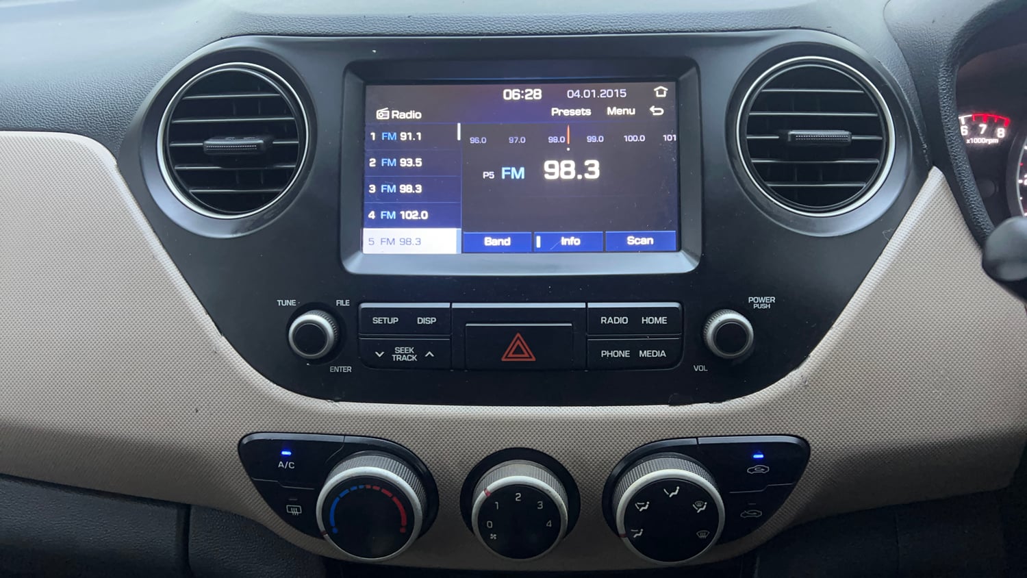 Used 2019 Hyundai Grand i10 Sportz 1.2 Kappa VTVT Petrol Manual interior MUSIC SYSTEM & AC CONTROL VIEW