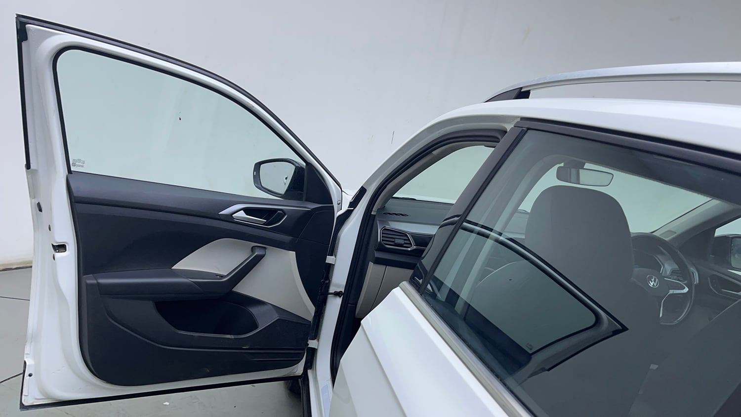 Used 2023 Volkswagen Taigun Topline 1.0 TSI AT Petrol Automatic interior LEFT FRONT DOOR OPEN VIEW
