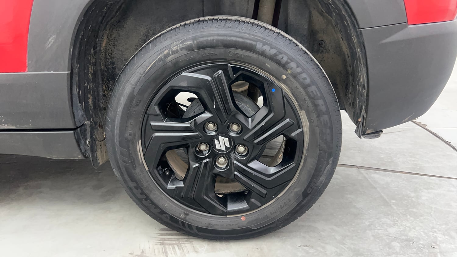 Used 2023 Maruti Suzuki Brezza Zxi Dual Tone Petrol Manual tyres LEFT REAR TYRE RIM VIEW