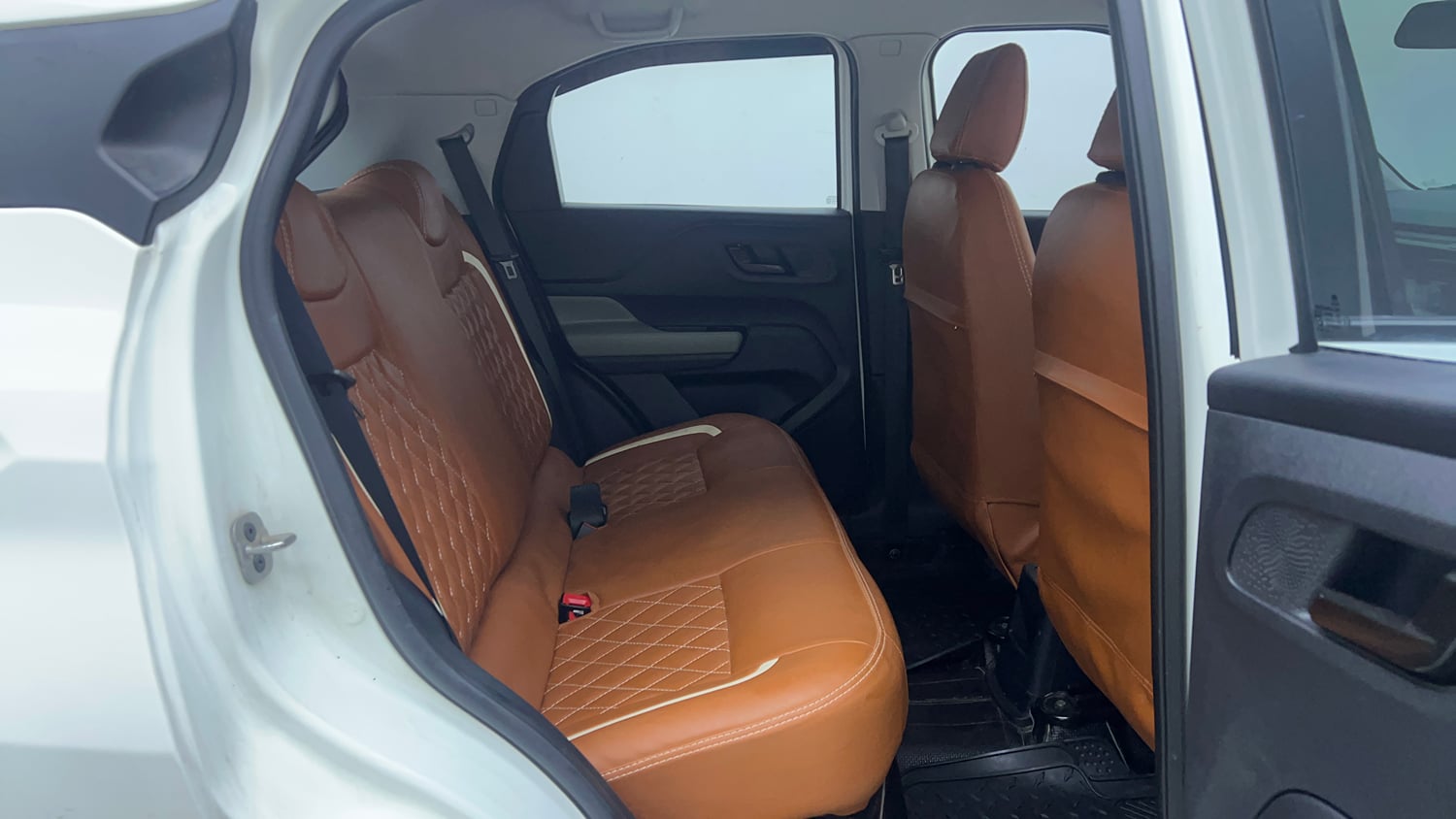 Used 2024 Tata Punch Adventure Rhythm Pack MT Petrol Manual interior RIGHT SIDE REAR DOOR CABIN VIEW