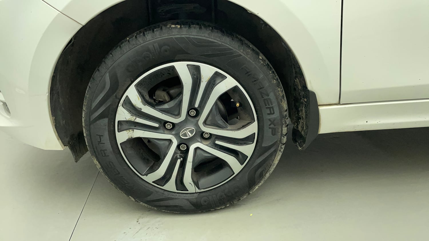 Used 2020 Tata Tiago Revotron XZ Petrol Manual tyres LEFT FRONT TYRE RIM VIEW