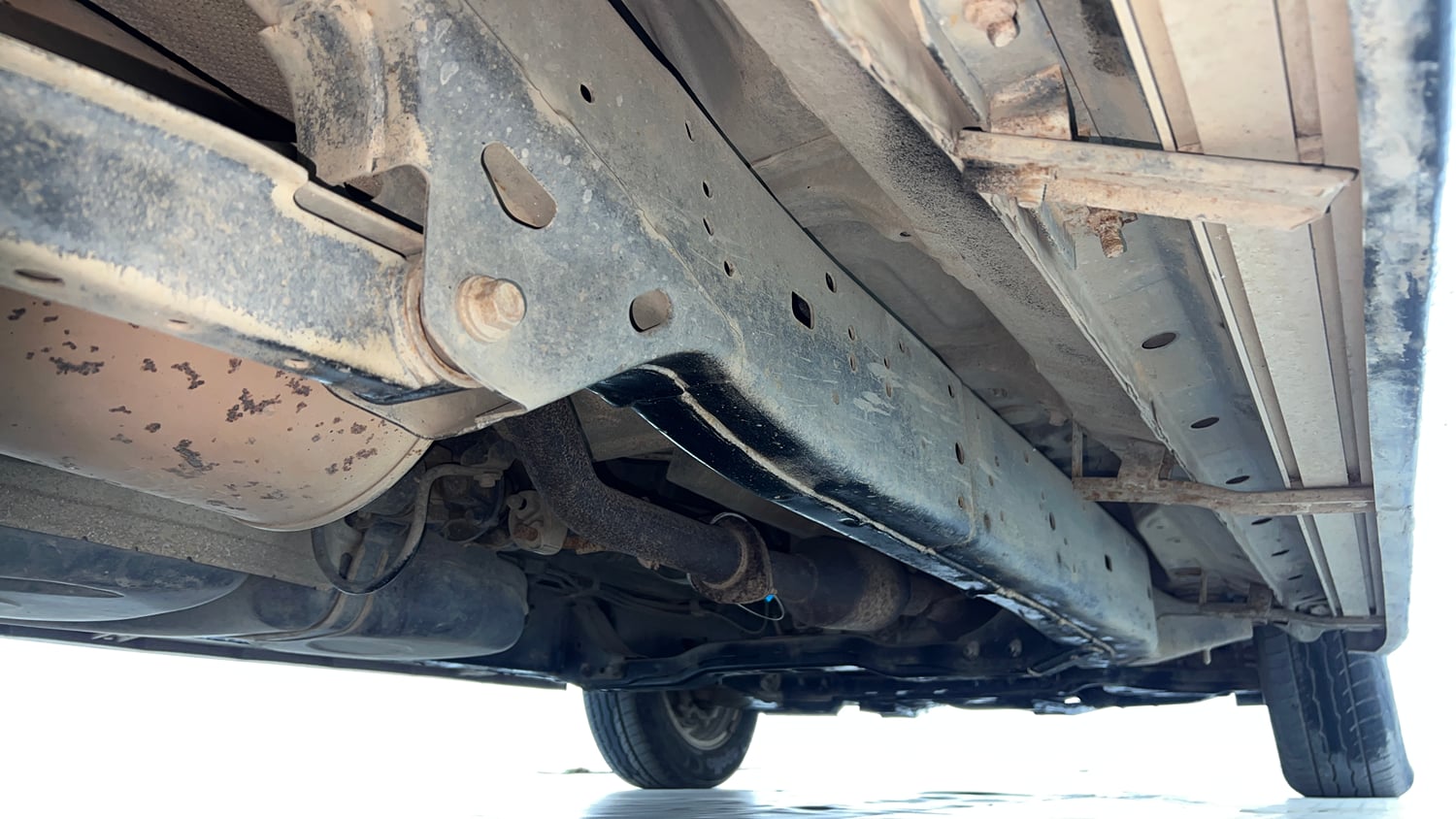 Used 2022 Toyota Innova Crysta VX 2.7 7 STR Petrol Manual extra REAR RIGHT UNDERBODY VIEW