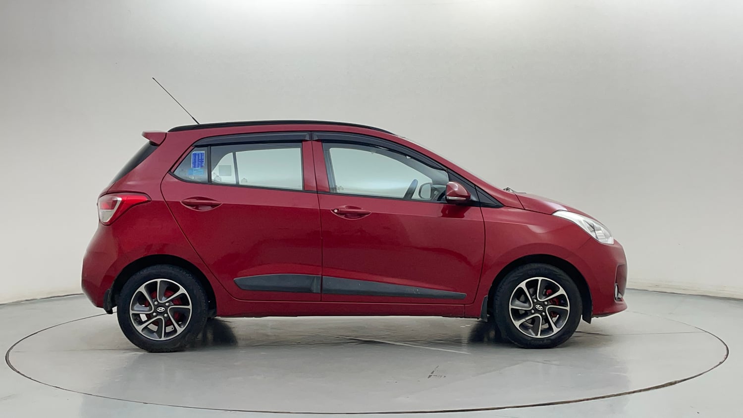 Used 2019 Hyundai Grand i10 Sportz 1.2 Kappa VTVT Petrol Manual exterior RIGHT SIDE VIEW