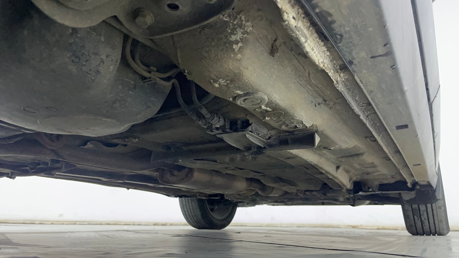 Used 2023 Volkswagen Taigun Topline 1.0 TSI AT Petrol Automatic extra REAR RIGHT UNDERBODY VIEW