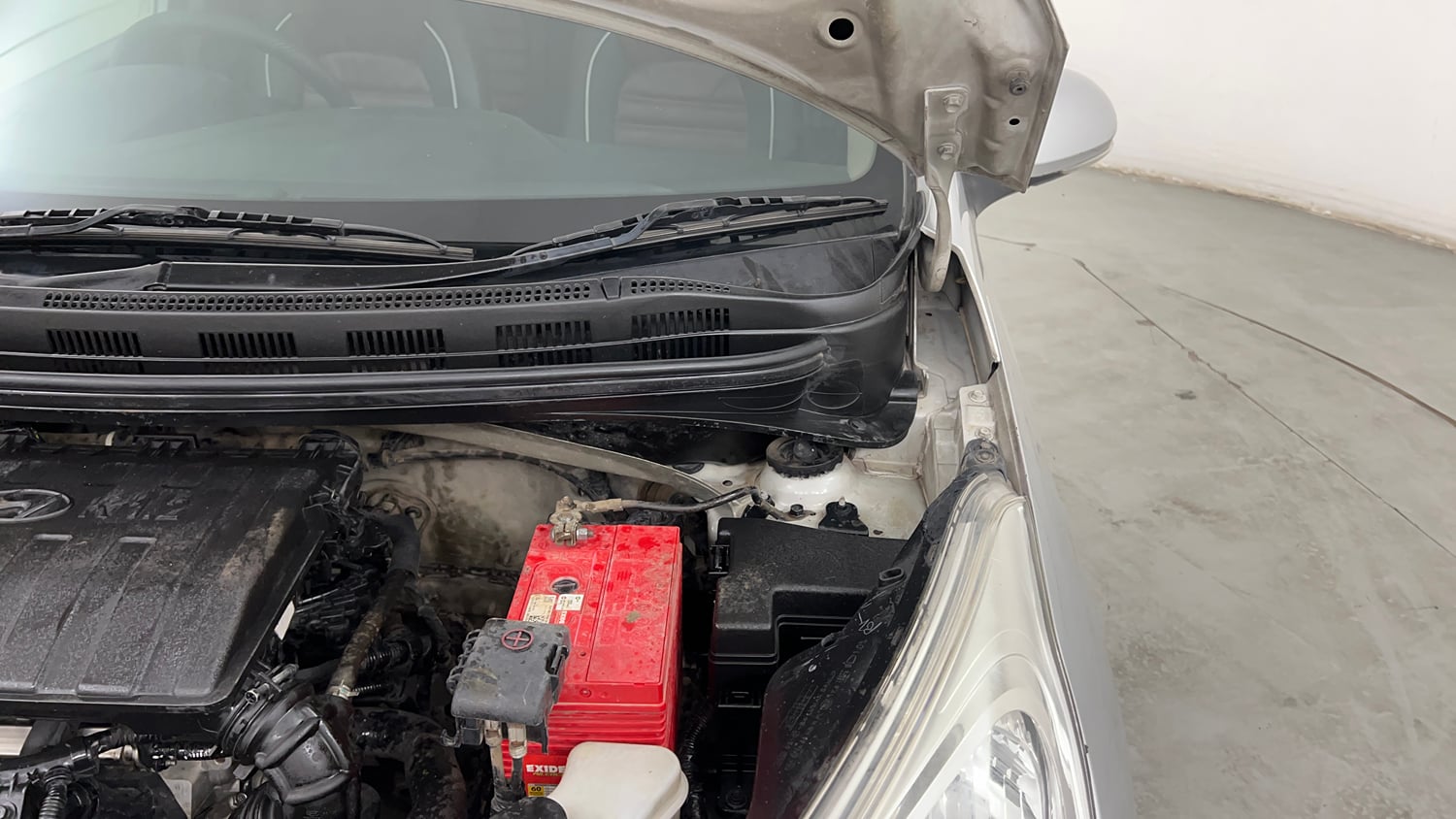 Used 2016 Hyundai Grand i10 Sportz 1.2 Kappa VTVT Petrol Manual engine ENGINE LEFT SIDE HINGE & APRON VIEW