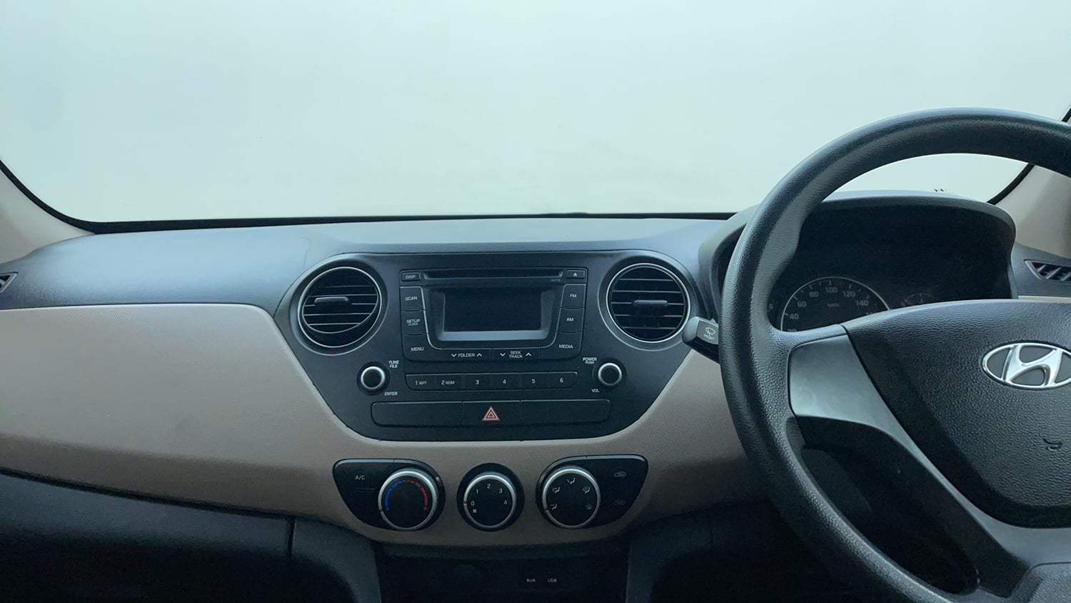 Used 2013 Hyundai Grand i10 Sportz 1.1 CRDi Diesel Manual interior MUSIC SYSTEM & AC CONTROL VIEW
