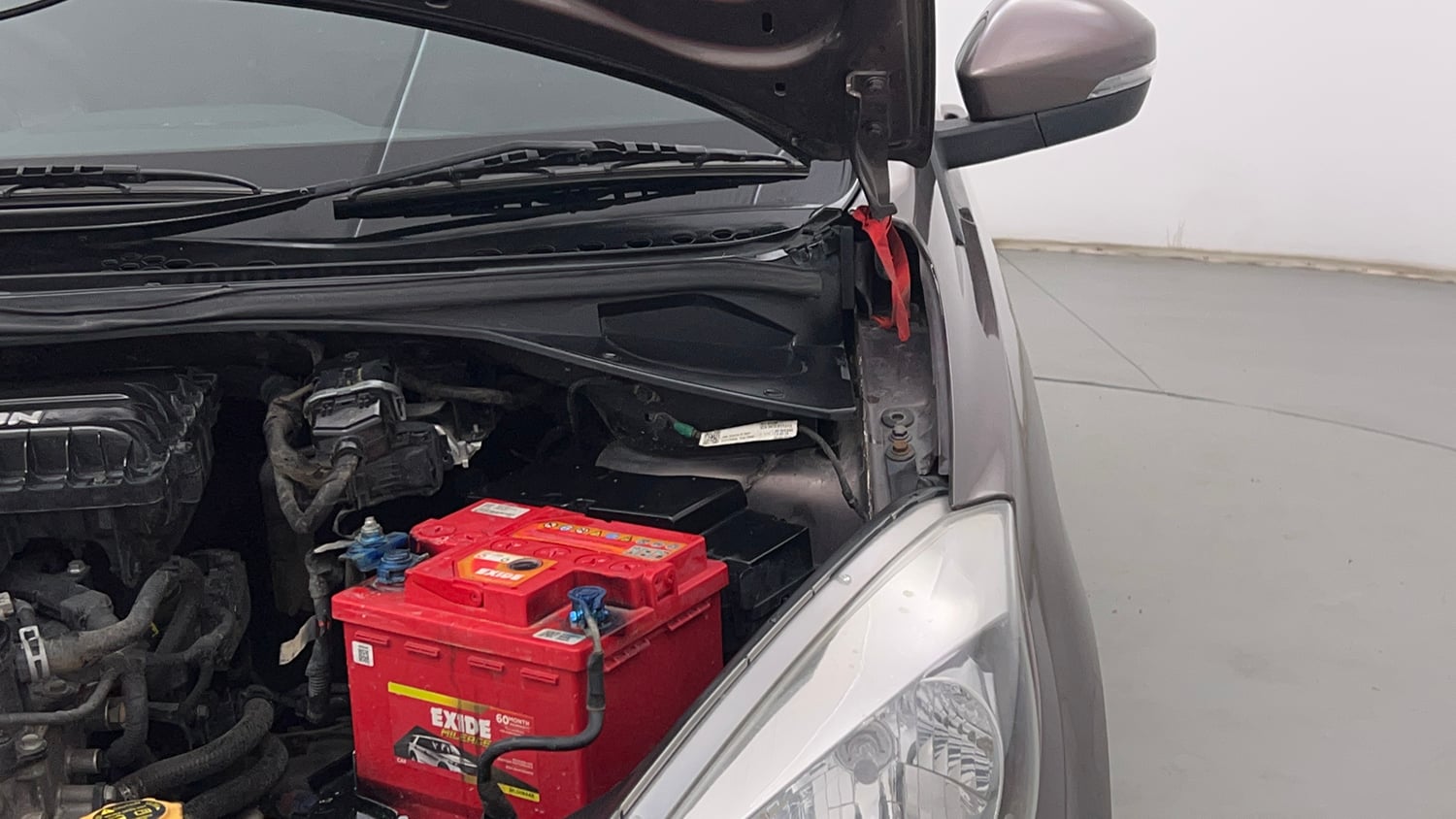 Used 2018 Tata Tiago Revotron XZ Petrol Manual engine ENGINE LEFT SIDE HINGE & APRON VIEW