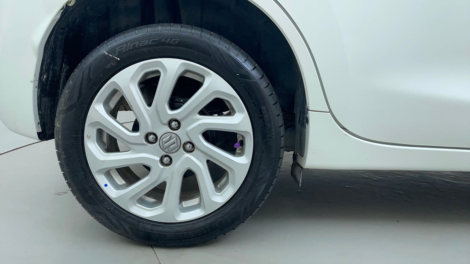 Used 2024 Maruti Suzuki Baleno Zeta AGS Petrol Automatic tyres RIGHT REAR TYRE RIM VIEW