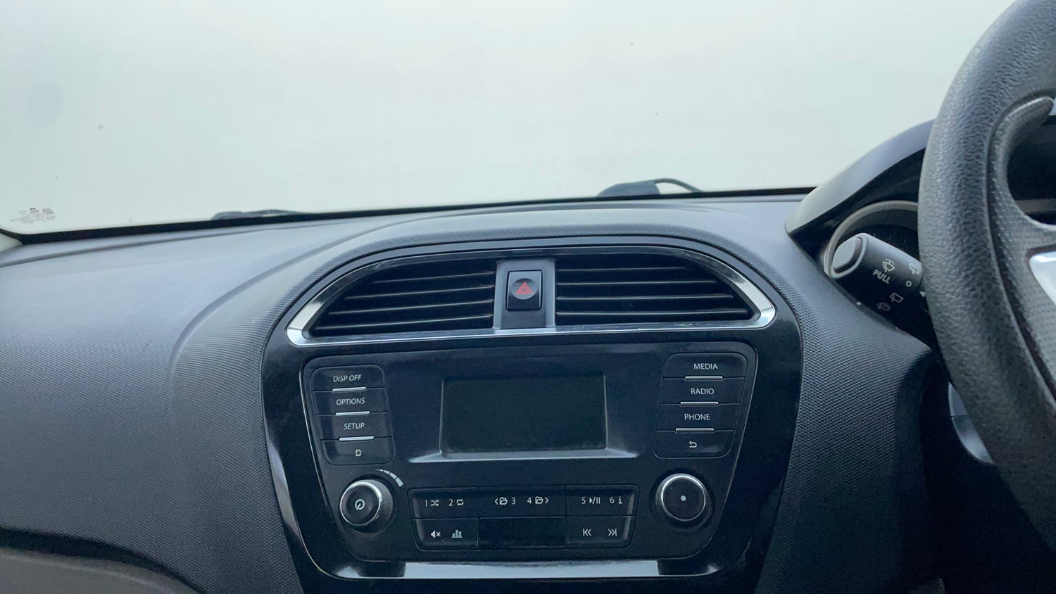 Used 2017 Tata Tiago Revotron XZ Petrol Manual top_features Integrated (in-dash) music system