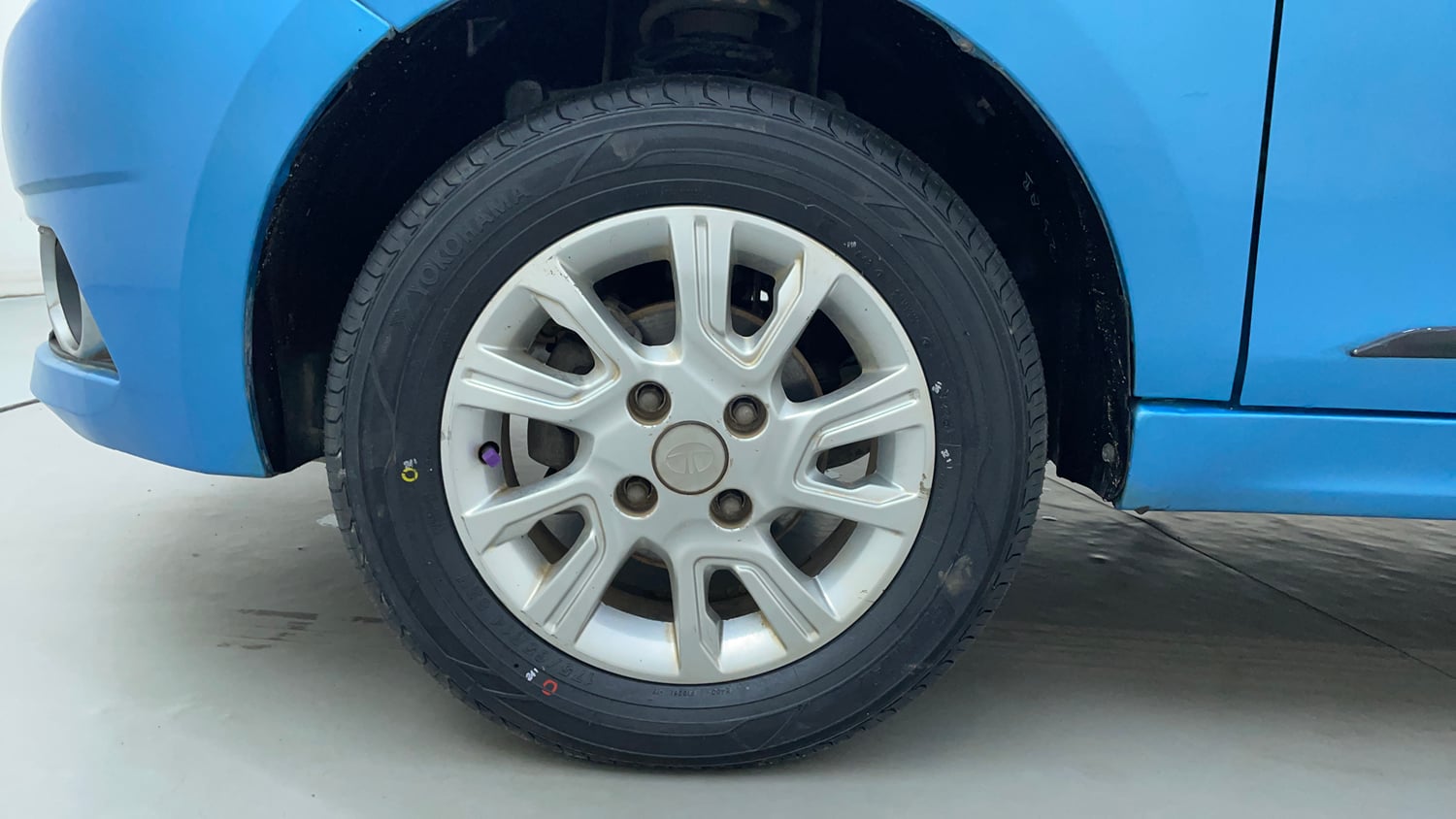 Used 2017 Tata Tiago Revotron XZ Petrol Manual tyres LEFT FRONT TYRE RIM VIEW