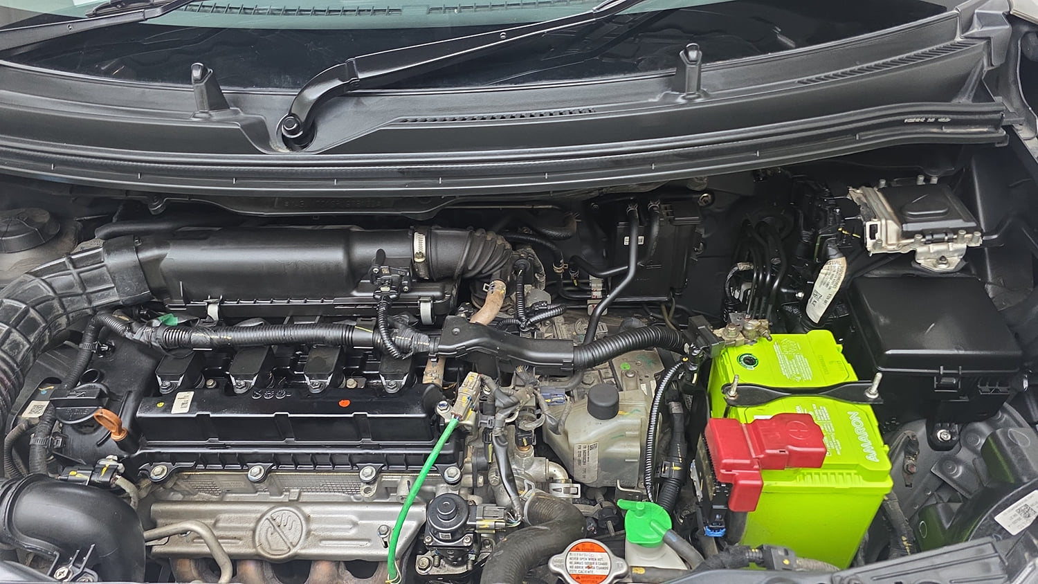 Used 2024 Maruti Suzuki Wagon R ZXI Plus 1.2 AGS Petrol Automatic engine ENGINE LEFT SIDE VIEW