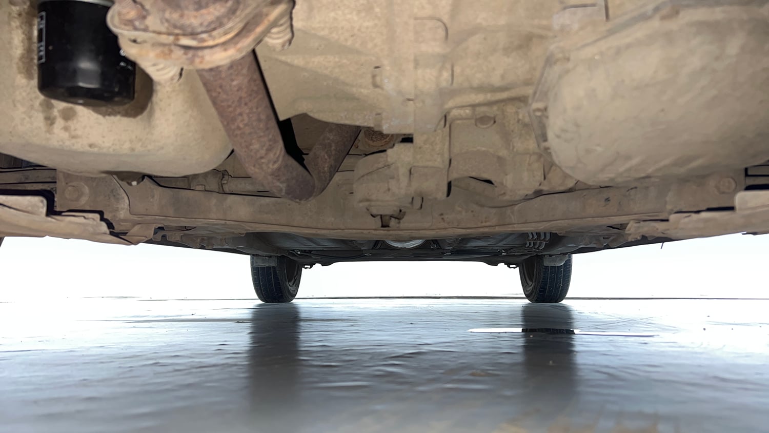 Used 2018 Maruti Suzuki Baleno Delta 1.2 AT Petrol Automatic extra FRONT LEFT UNDERBODY VIEW