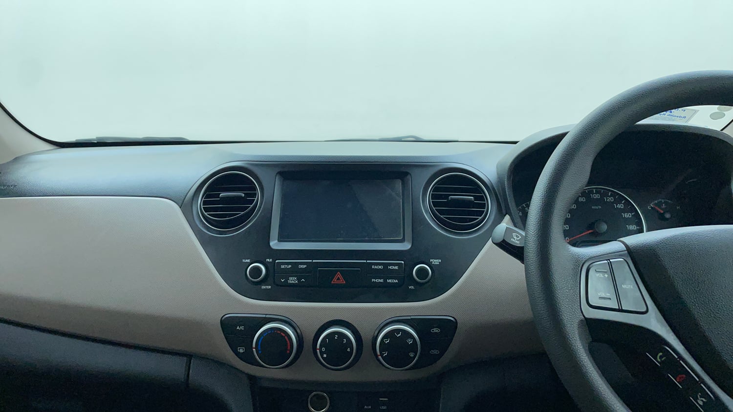 Used 2019 Hyundai Grand i10 Sportz 1.2 Kappa VTVT Petrol Manual interior MUSIC SYSTEM & AC CONTROL VIEW