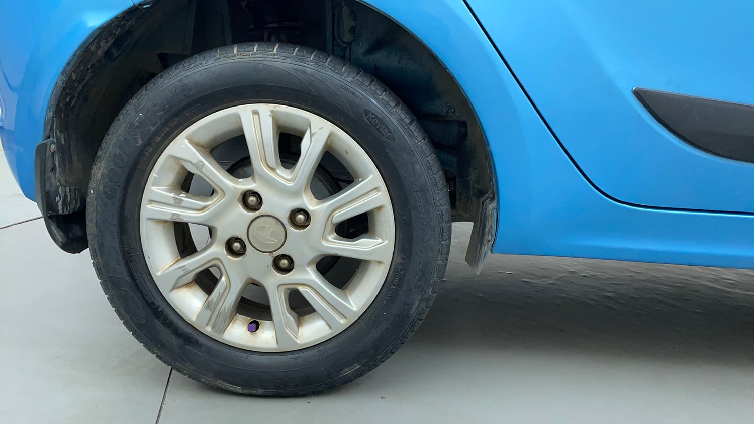 Used 2017 Tata Tiago Revotron XZ Petrol Manual tyres RIGHT REAR TYRE RIM VIEW