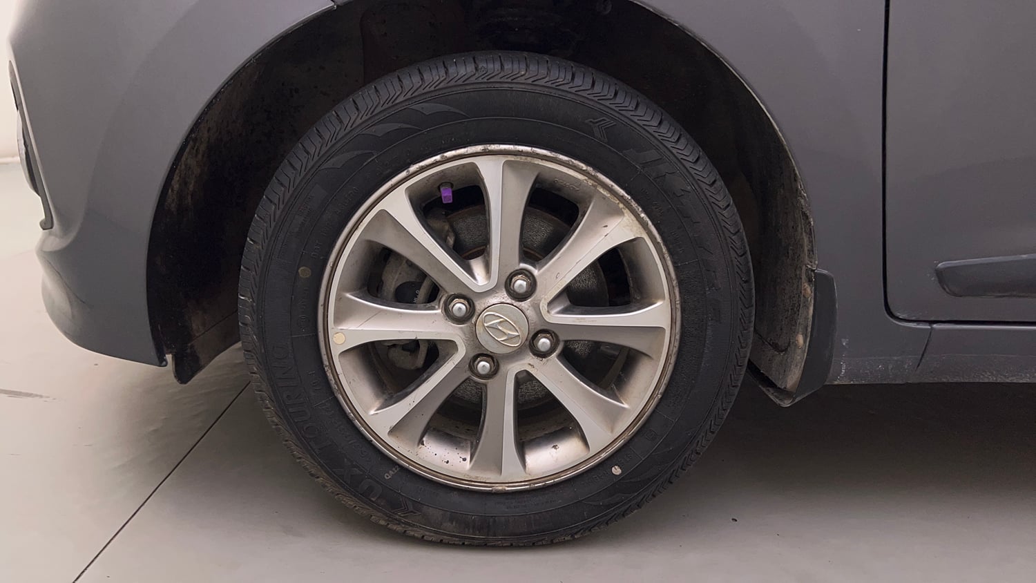 Used 2016 Hyundai Grand i10 Asta 1.2 Kappa VTVT (O) Petrol Manual tyres LEFT FRONT TYRE RIM VIEW