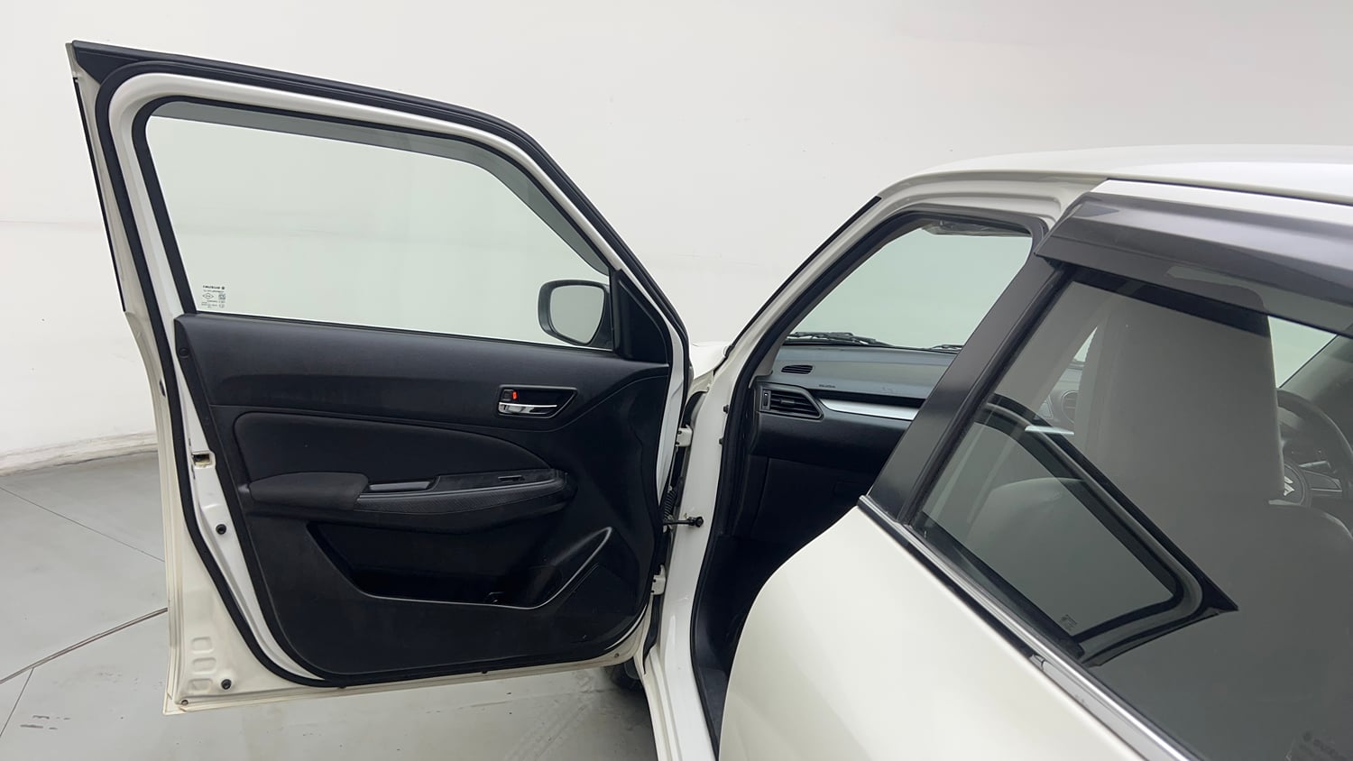 Used 2021 Maruti Suzuki Swift VXi Petrol Manual interior LEFT FRONT DOOR OPEN VIEW