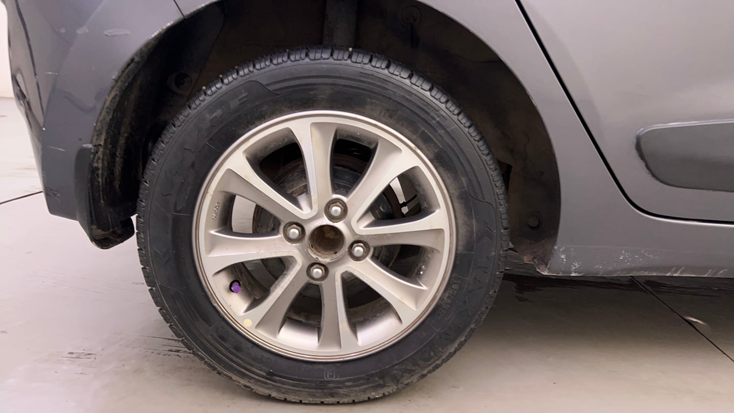 Used 2016 Hyundai Grand i10 Asta 1.2 Kappa VTVT (O) Petrol Manual tyres RIGHT REAR TYRE RIM VIEW