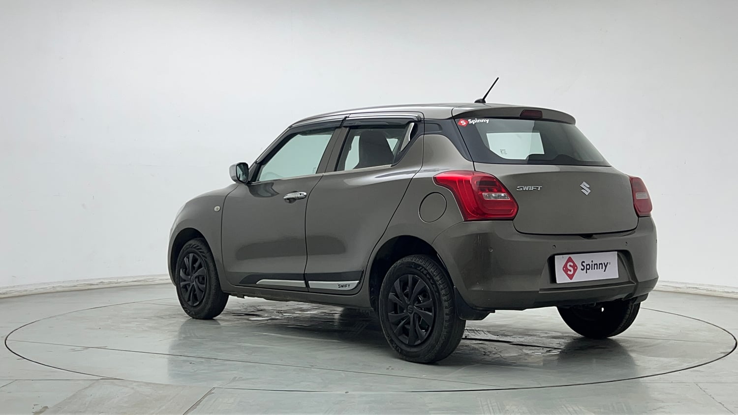 Used 2023 Maruti Suzuki Swift LXi Petrol Manual exterior LEFT REAR CORNER VIEW
