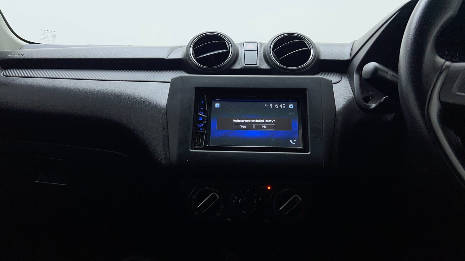 Used 2023 Maruti Suzuki Swift LXi Petrol Manual interior MUSIC SYSTEM & AC CONTROL VIEW