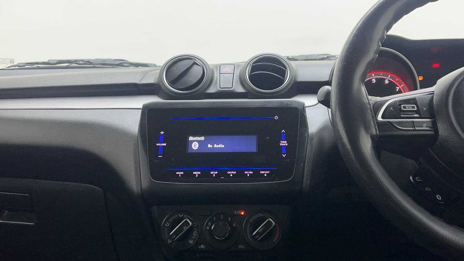 Used 2021 Maruti Suzuki Swift VXi Petrol Manual interior MUSIC SYSTEM & AC CONTROL VIEW