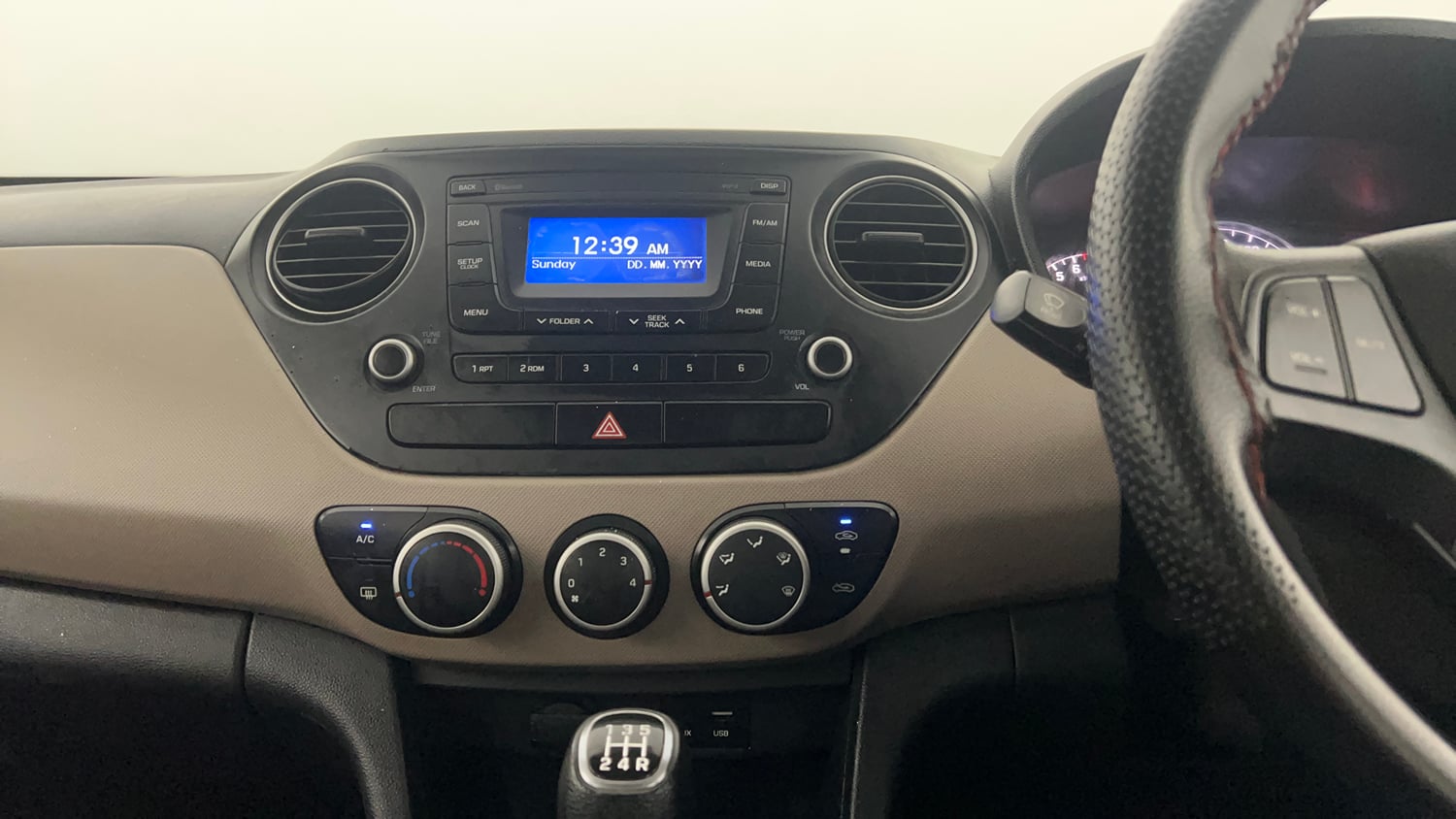 Used 2016 Hyundai Grand i10 Sportz 1.2 Kappa VTVT Petrol Manual interior MUSIC SYSTEM & AC CONTROL VIEW
