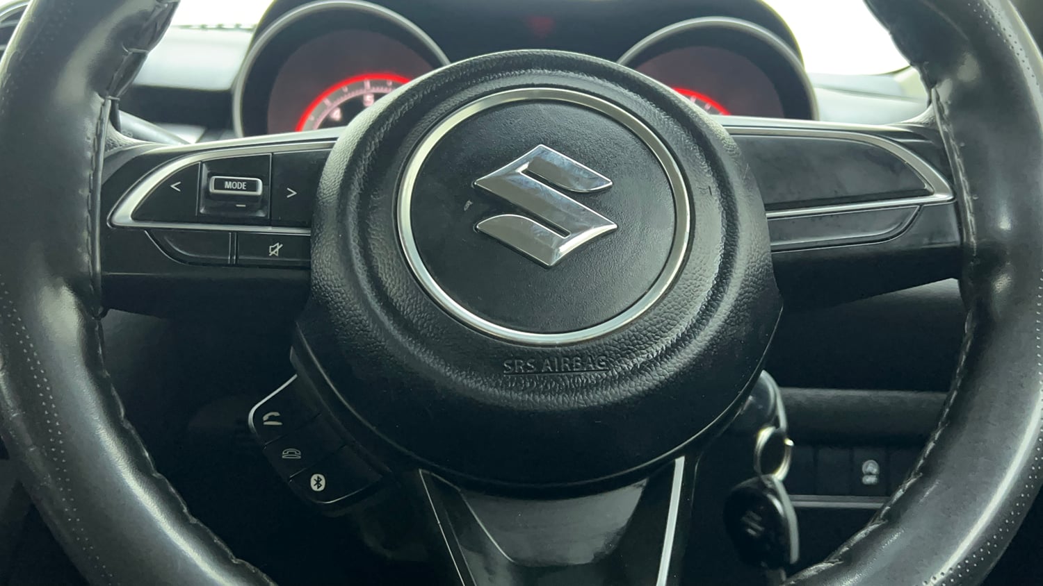 Used 2021 Maruti Suzuki Swift VXi Petrol Manual top_features Steering mounted controls