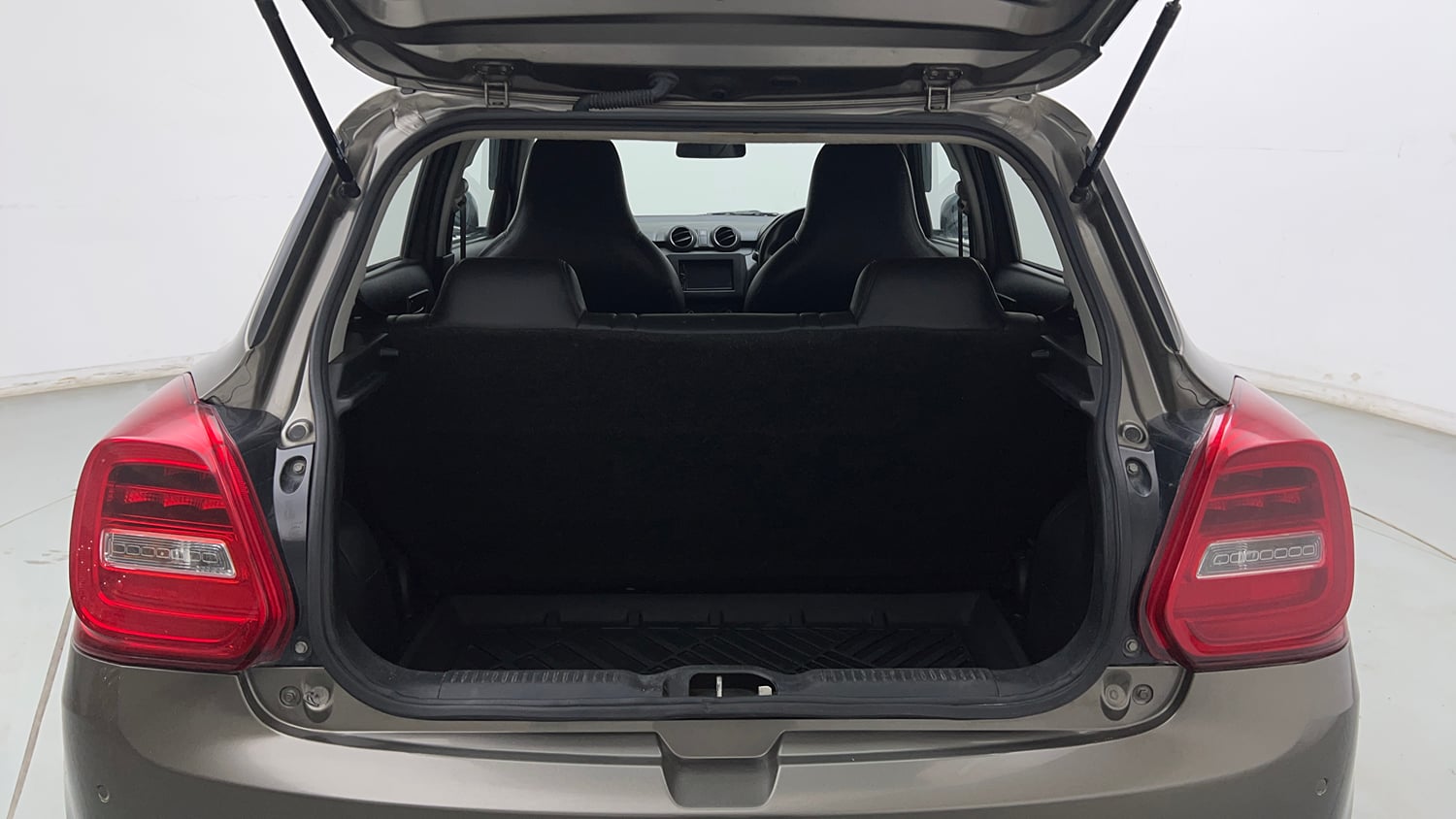 Used 2023 Maruti Suzuki Swift LXi Petrol Manual interior DICKY INSIDE VIEW