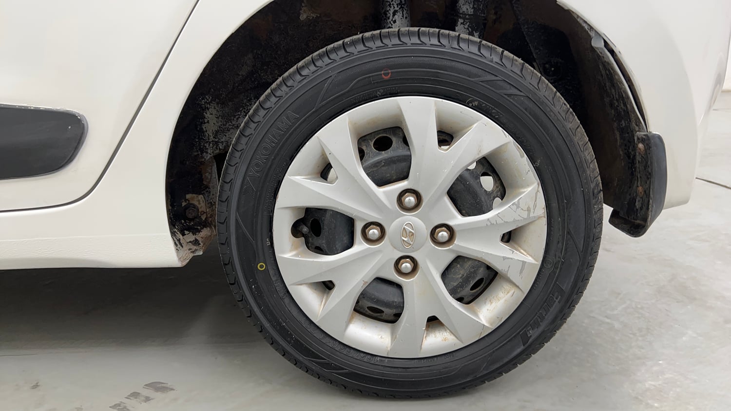 Used 2015 Hyundai Grand i10 Sportz 1.2 Kappa VTVT Petrol Manual tyres LEFT REAR TYRE RIM VIEW