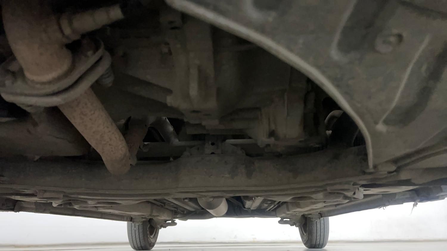 Used 2013 Maruti Suzuki Swift VXi Petrol Manual extra FRONT LEFT UNDERBODY VIEW
