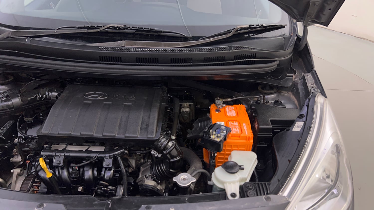 Used 2016 Hyundai Grand i10 Asta 1.2 Kappa VTVT (O) Petrol Manual engine ENGINE LEFT SIDE HINGE & APRON VIEW
