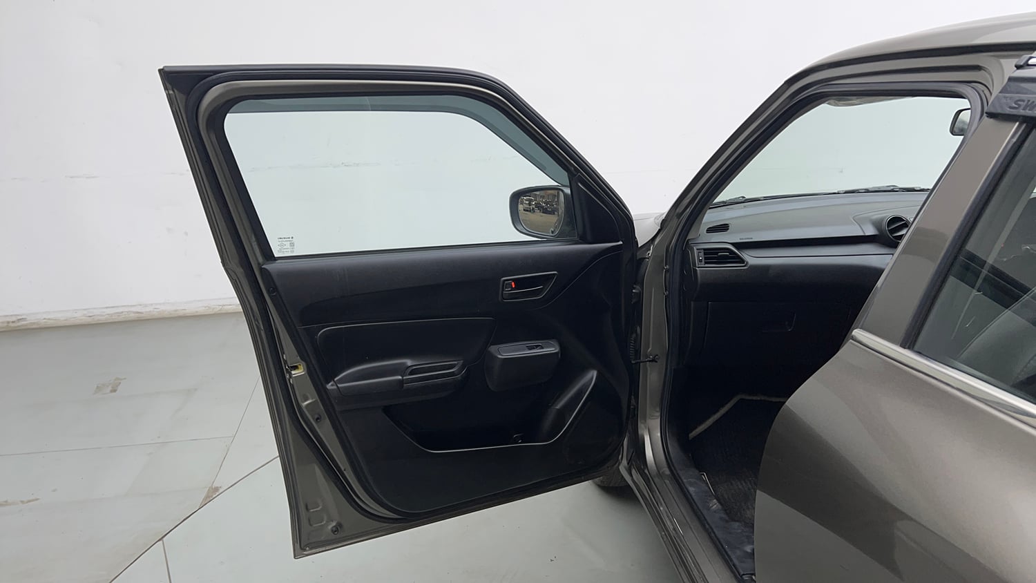 Used 2023 Maruti Suzuki Swift LXi Petrol Manual interior LEFT FRONT DOOR OPEN VIEW