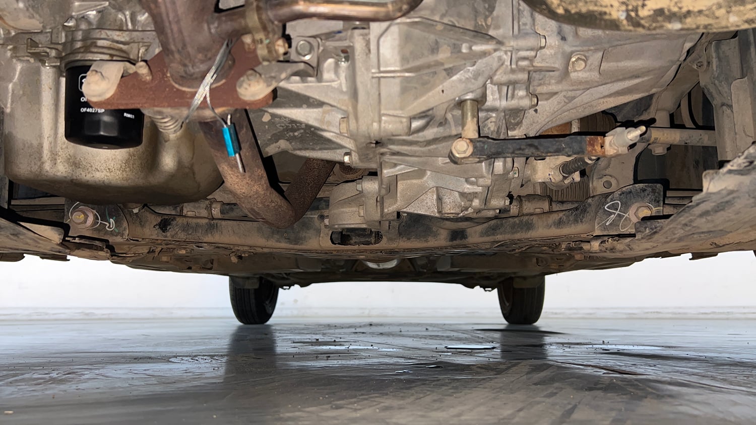 Used 2023 Maruti Suzuki Swift LXi Petrol Manual extra FRONT LEFT UNDERBODY VIEW