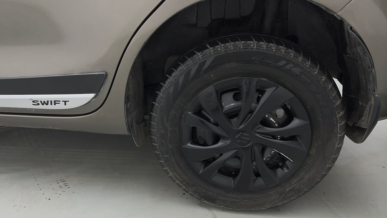 Used 2023 Maruti Suzuki Swift LXi Petrol Manual tyres LEFT REAR TYRE RIM VIEW