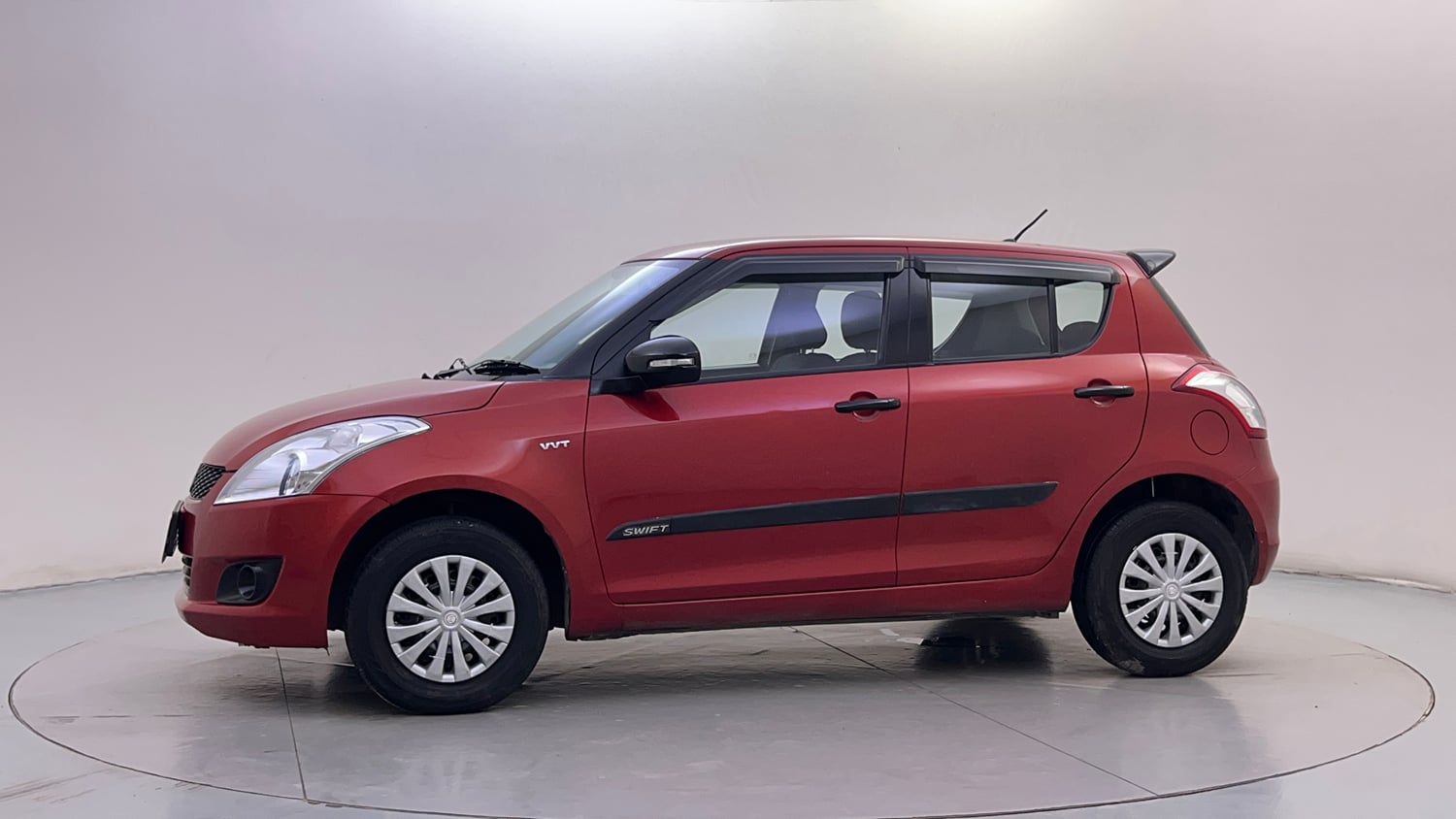 Used 2012 Maruti Suzuki Swift VXi Petrol Manual exterior LEFT SIDE VIEW