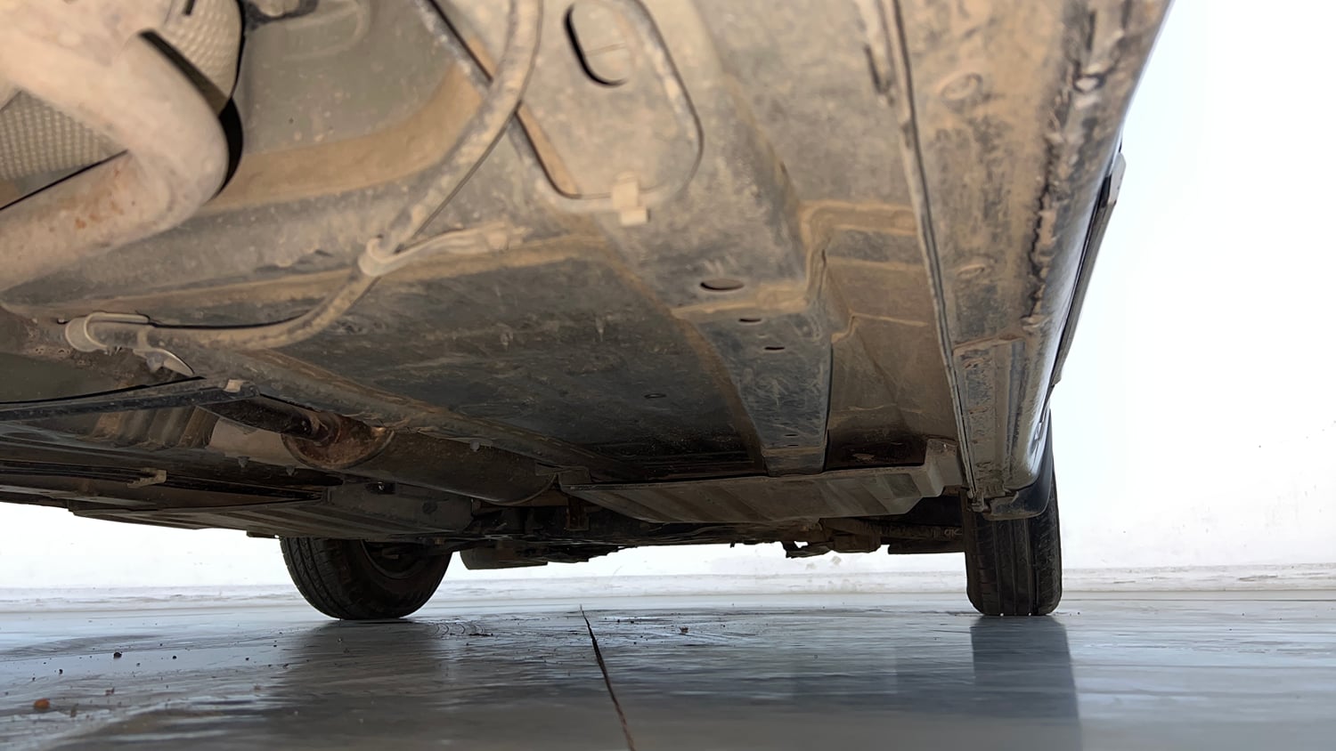 Used 2023 Maruti Suzuki Swift LXi Petrol Manual extra REAR RIGHT UNDERBODY VIEW