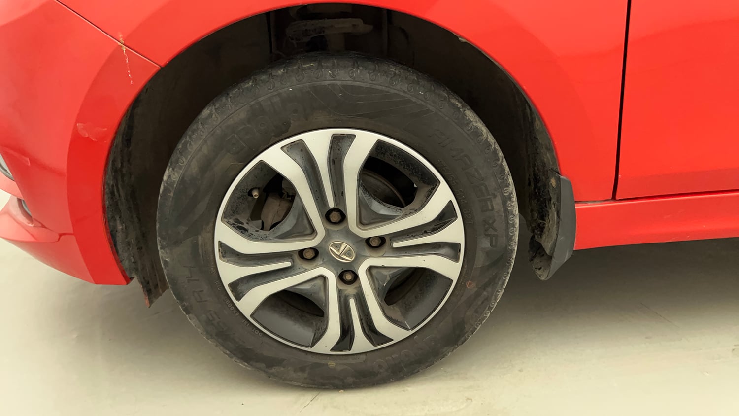 Used 2021 Tata Tiago XZ Petrol Manual tyres LEFT FRONT TYRE RIM VIEW