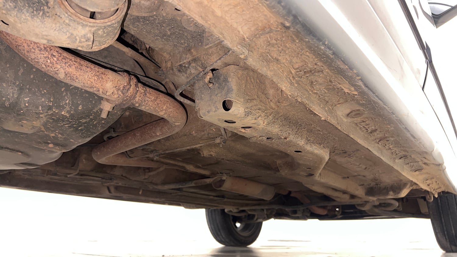 Used 2019 Tata Tiago Revotron XZ Plus Dual Tone Petrol Manual extra REAR RIGHT UNDERBODY VIEW