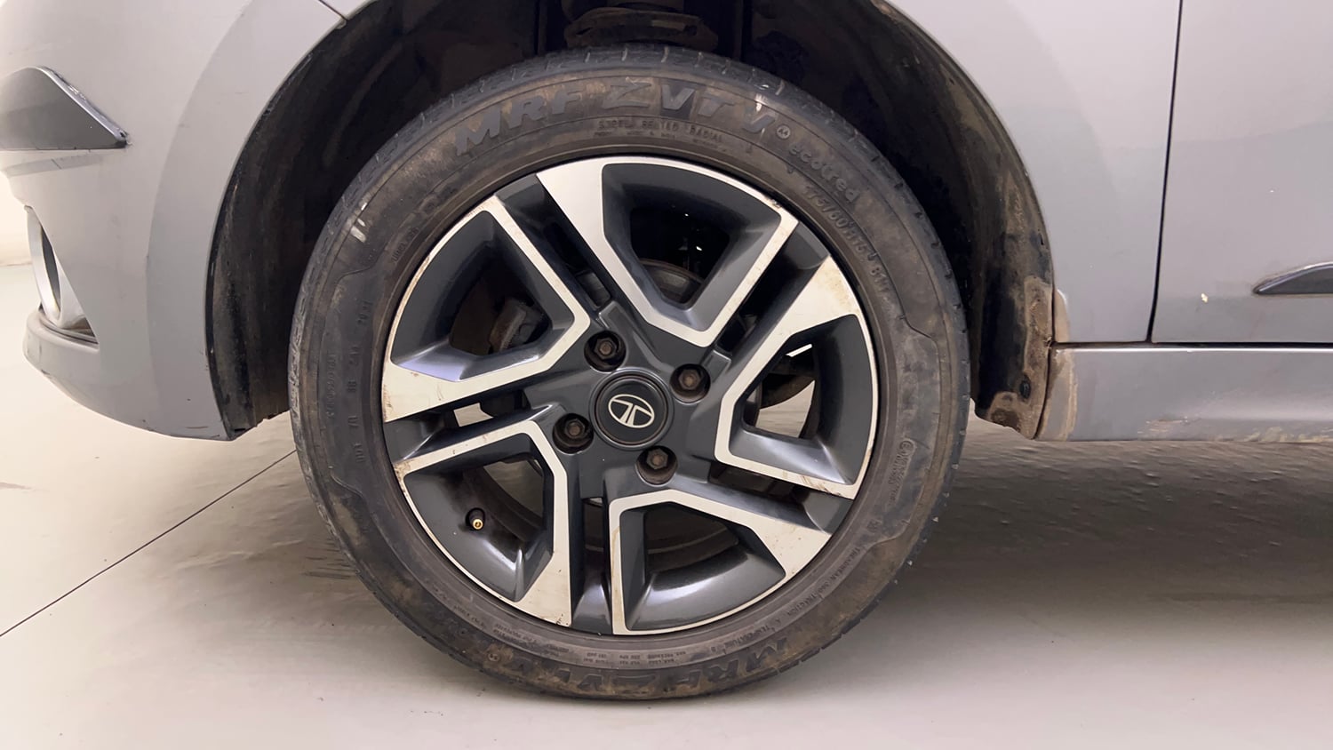 Used 2019 Tata Tiago Revotron XZ Plus Dual Tone Petrol Manual tyres LEFT FRONT TYRE RIM VIEW