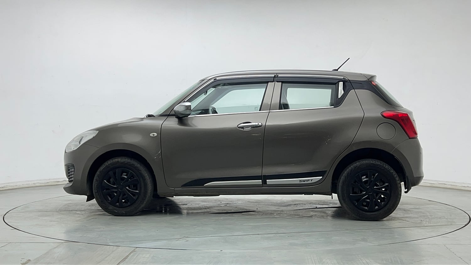Used 2023 Maruti Suzuki Swift LXi Petrol Manual exterior LEFT SIDE VIEW