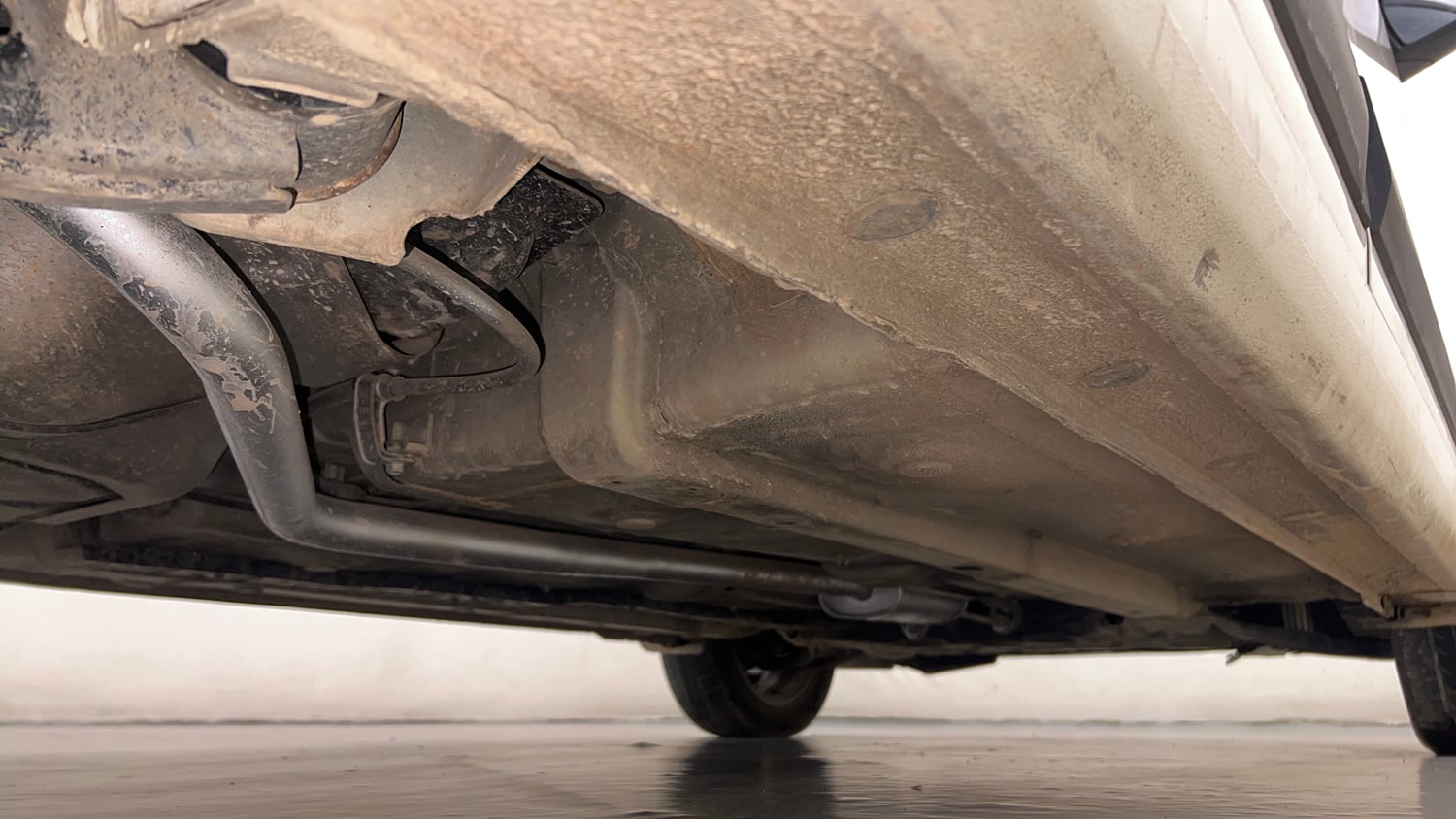 Used 2015 Hyundai Xcent SX 1.2 (O) Petrol Manual extra REAR RIGHT UNDERBODY VIEW