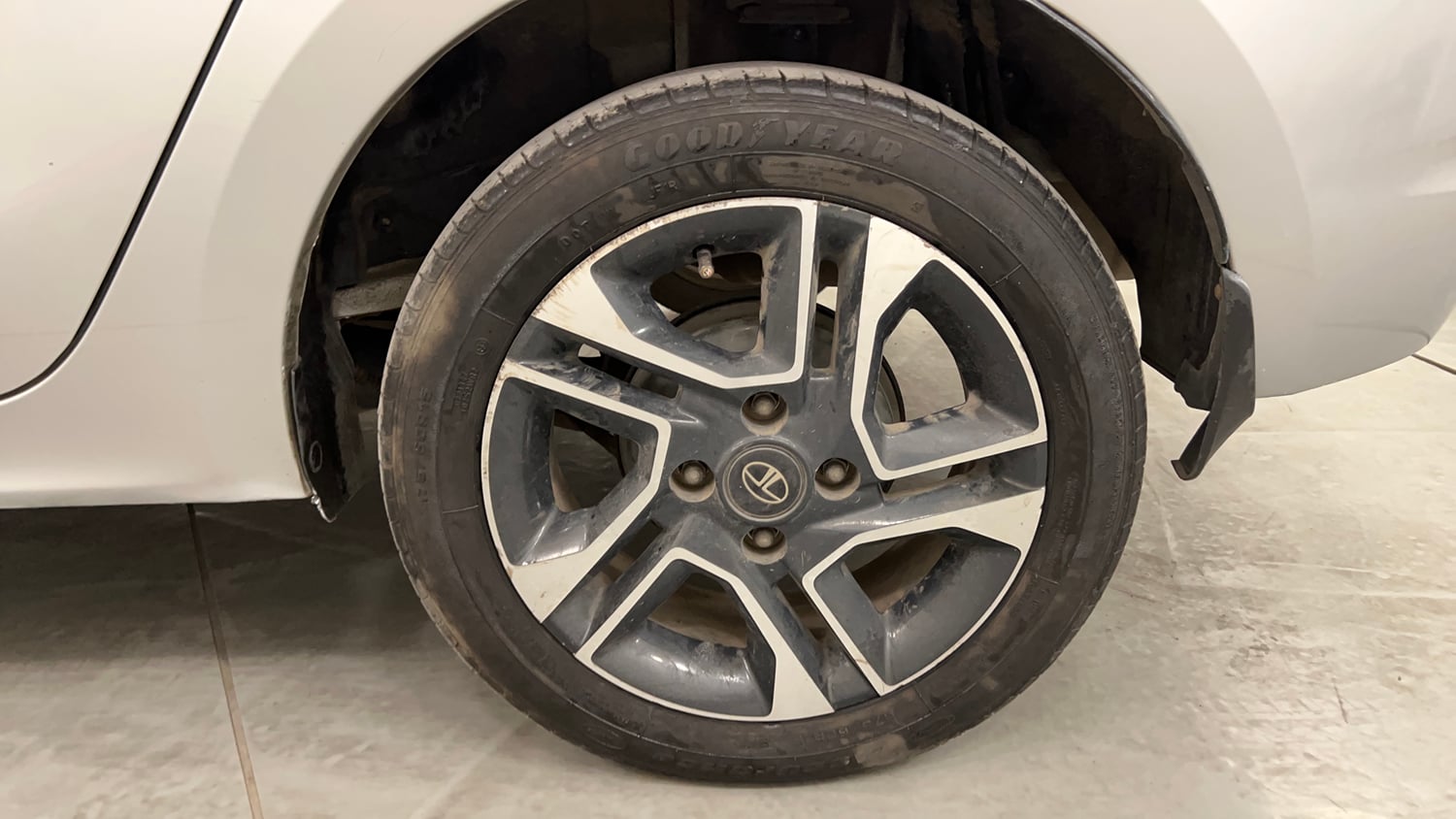 Used 2018 Tata Tigor Revotron XZ (O) Petrol Manual tyres LEFT REAR TYRE RIM VIEW